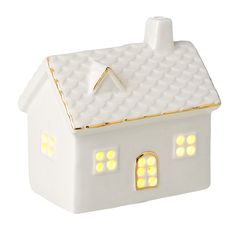 White porcelain light up house with gold edge