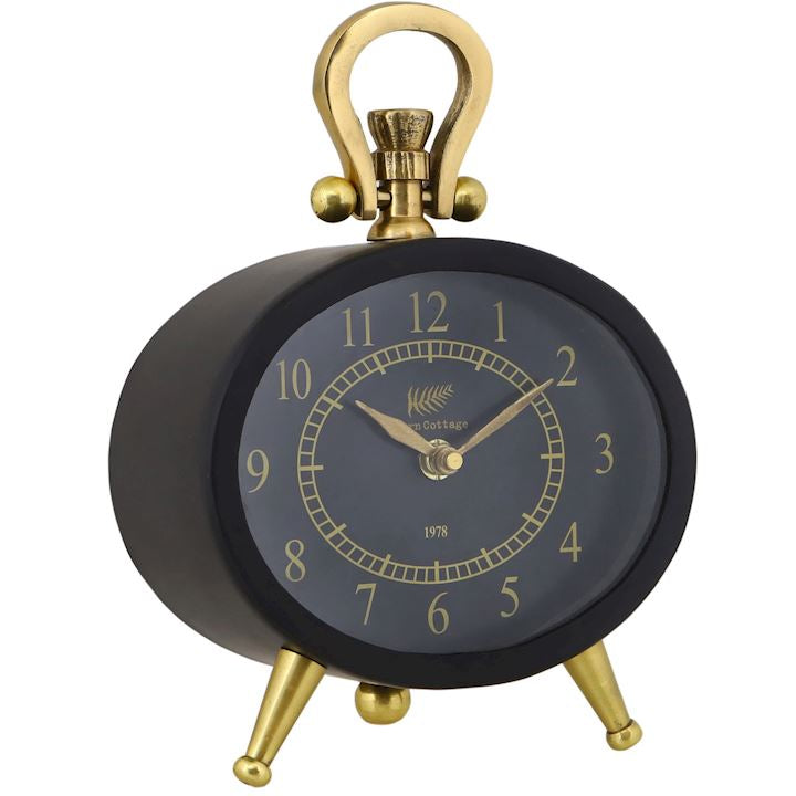 Oval Black and brass connolly table clock