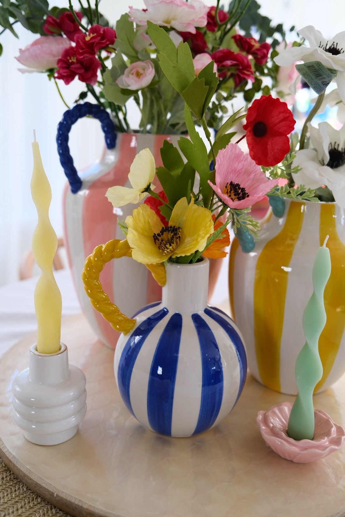 Blue & white stripe vase with yellow rope handle