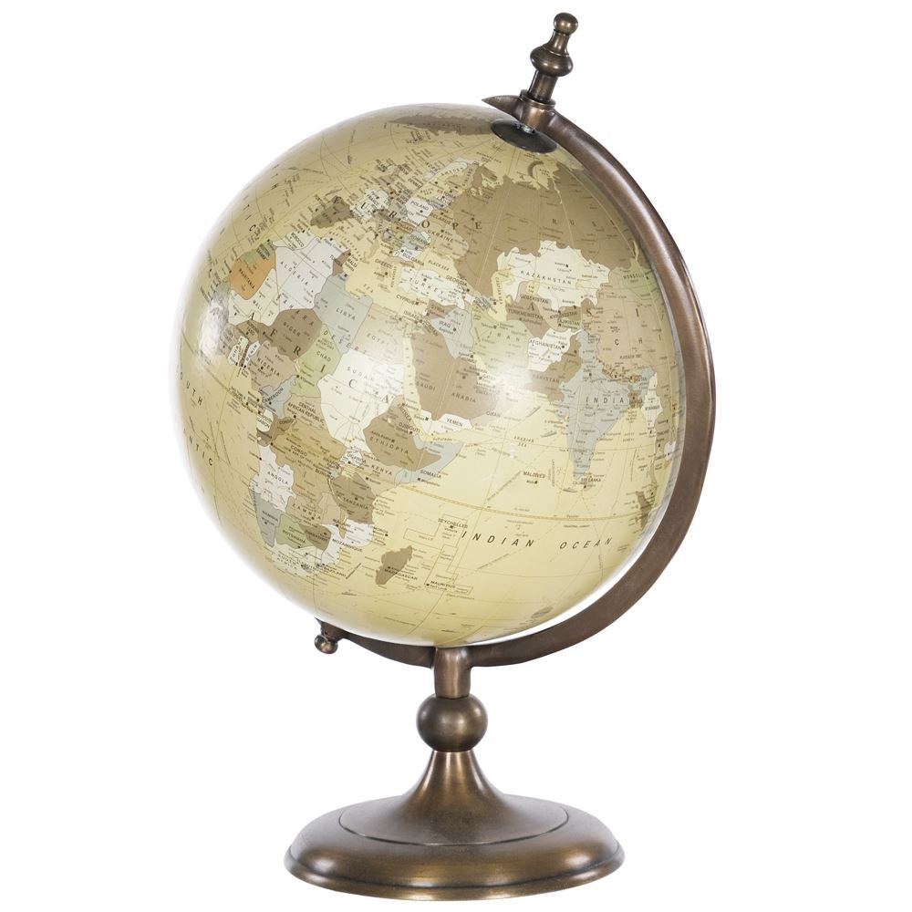 World globe on brass