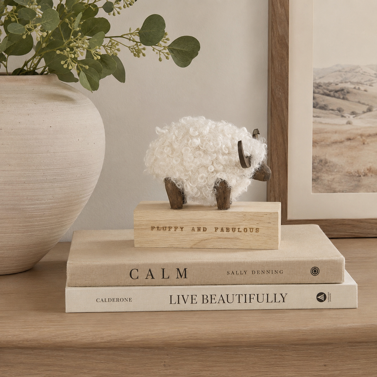 White fluffy & fabulous ram on wooden block