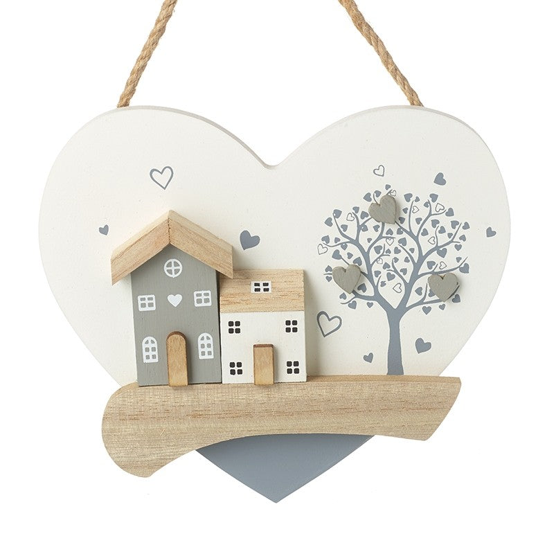 Hanging wooden heart with houses