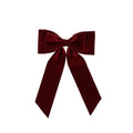 Burgundy velvet bow on clip