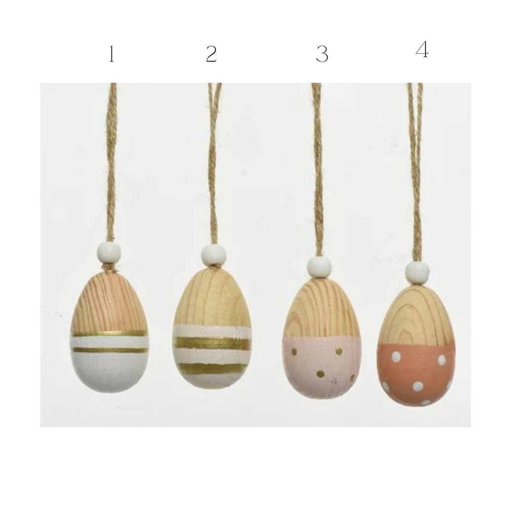 Wooden Easter eggs with stripes and spots