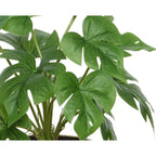 Faux plant in pot with feet