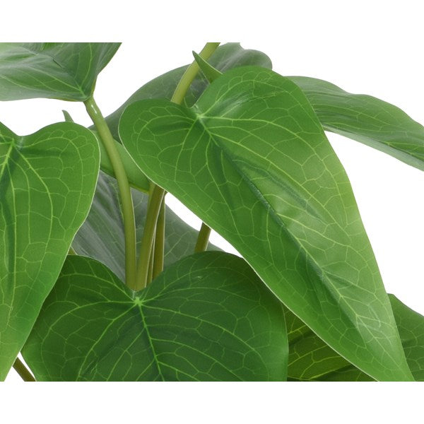 Faux plant in pot with feet