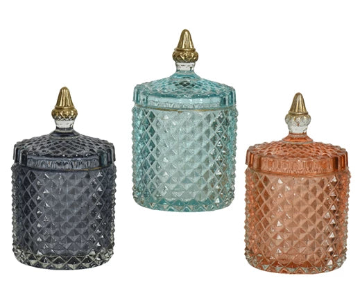 Coloured glass storage jar with ornate lid