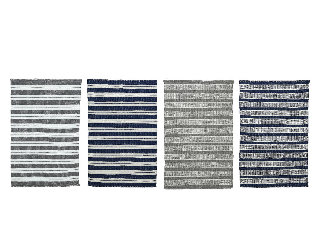 Monochrome striped outdoor rugs