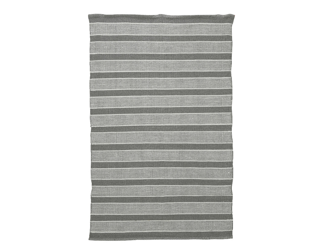 Monochrome striped outdoor rugs