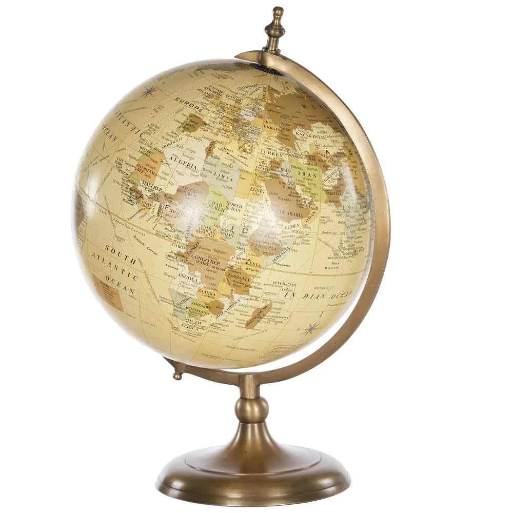 World globe on brass