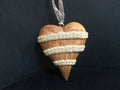 Wooden heart embellished with pearls and beads