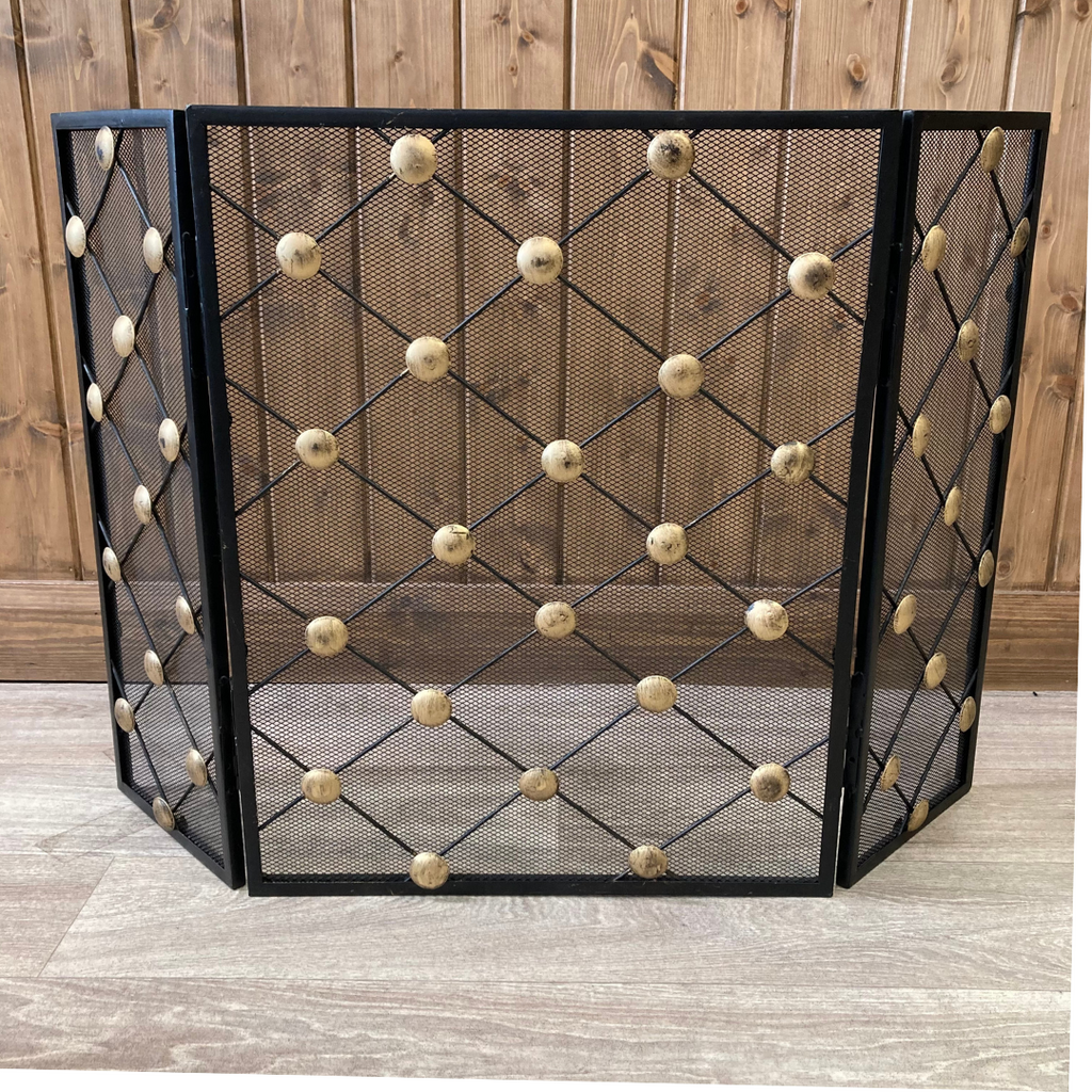 3 fold firescreen with lattice patter and brass studding