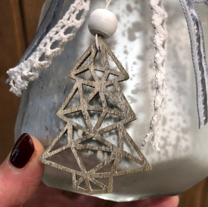 Frosted and speckled glass tealight with ribbons and Christmas tree