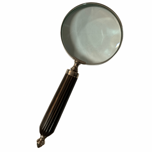 Brown handled magnifying glass