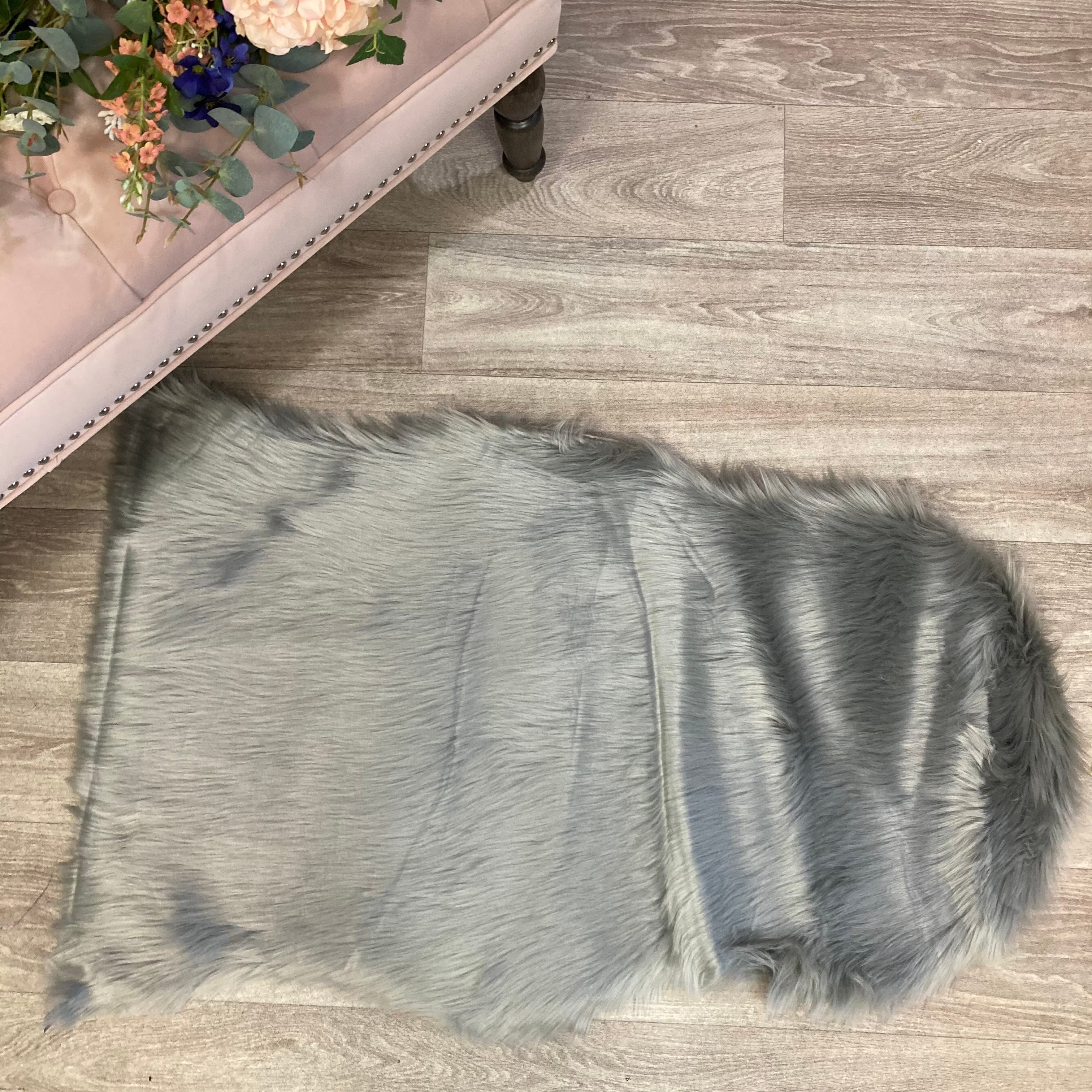 Grey faux fur rug