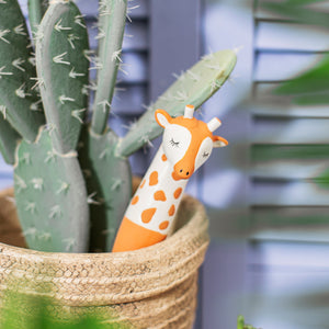 Gina the giraffe plant watering device
