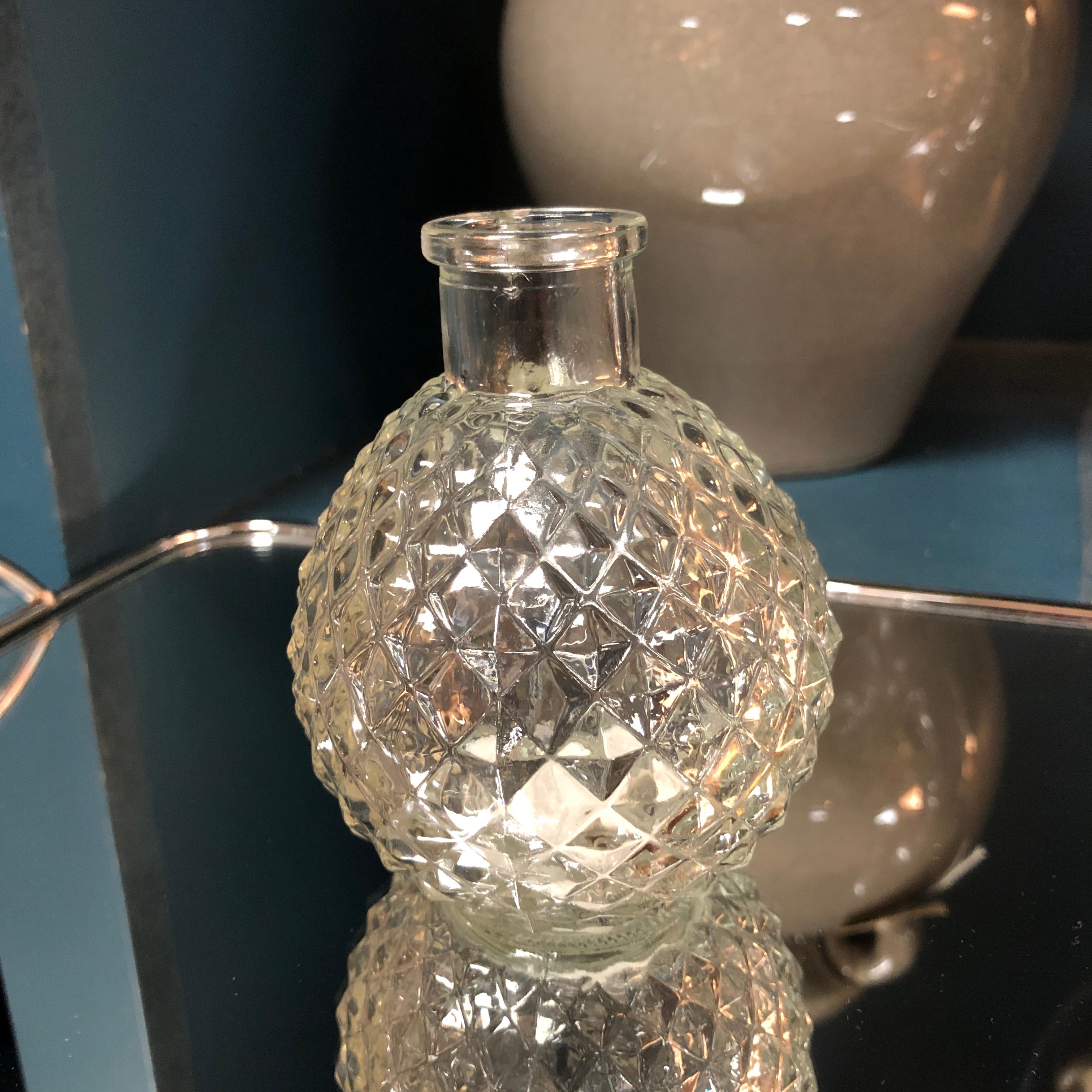 Short glass bud vase
