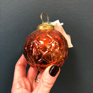 Small shiny copper bauble