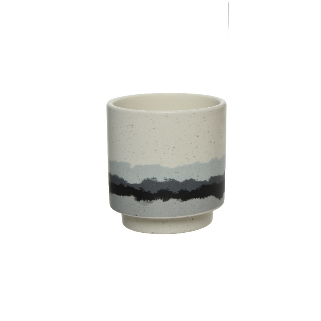 Speckled planter with coloured waves